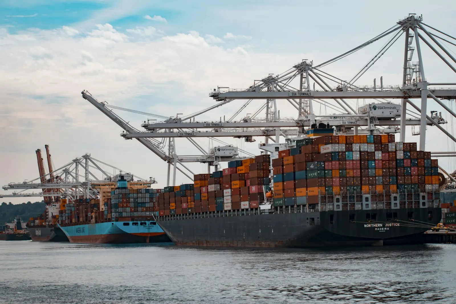 Container ship being loaded at a port terminal